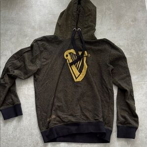 Guinness Black and Gold Sweater with Harp Design
